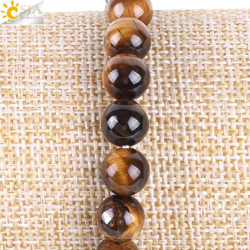 “Natural stone bracelet with Tiger’s Eye beads and Tree of Life symbol”