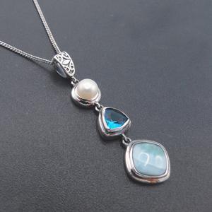 Healing gemstone amulet promoting balance, love, and intuition
