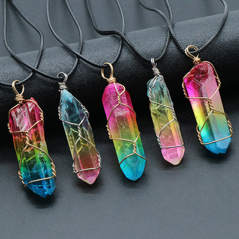 Close-up of healing stone crystal pillar necklace with Tree of Life charm
