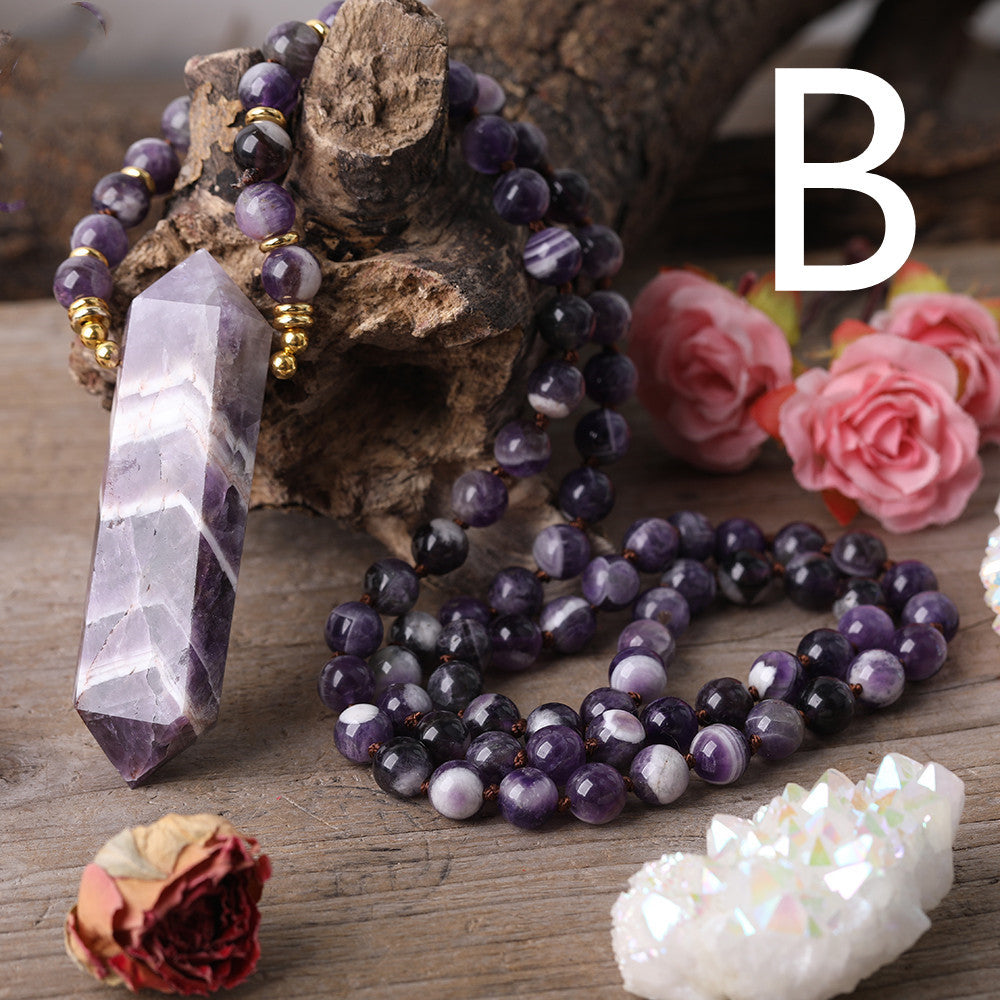 Handmade necklace featuring chevron-patterned amethyst and  quartz crystals