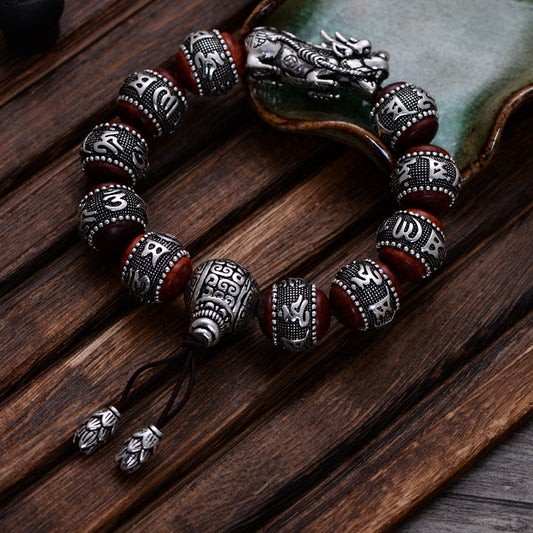 Handcrafted Spiritual Amulet – Six-Character Red Sandalwood Bracelet with Silver Dragon