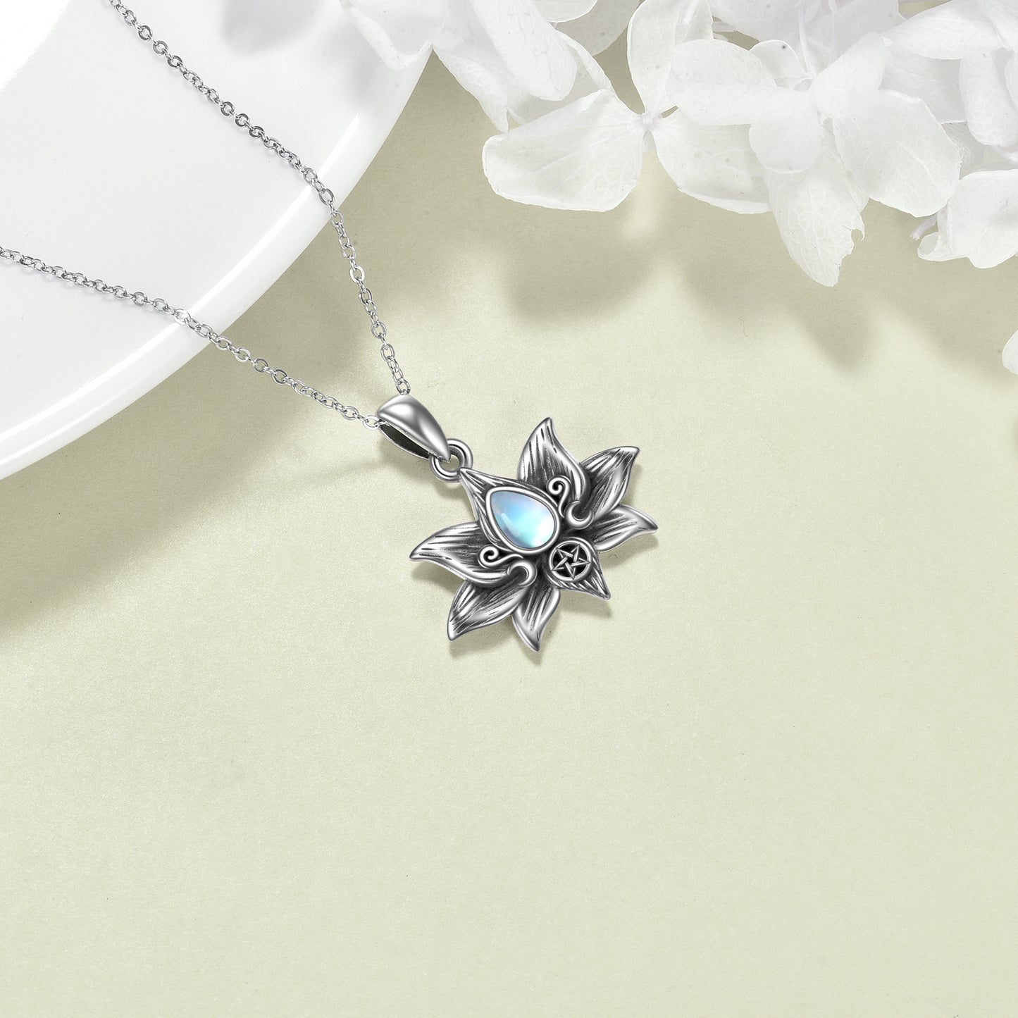 Elegant moonstone lotus pendant for protection and spiritual growth