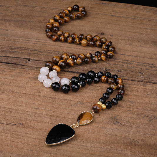 Handmade necklace with faceted black agate teardrop pendant and gemstone beads